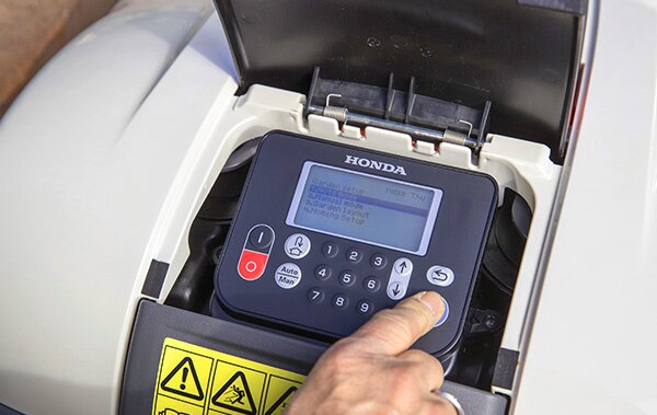 Honda dealer programming Honda Miimo to customer needs